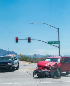 Red SUV accident at intersection in Scottsdale, Arizona