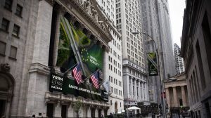 Wallstreet with Verra Mobility signage and american flags