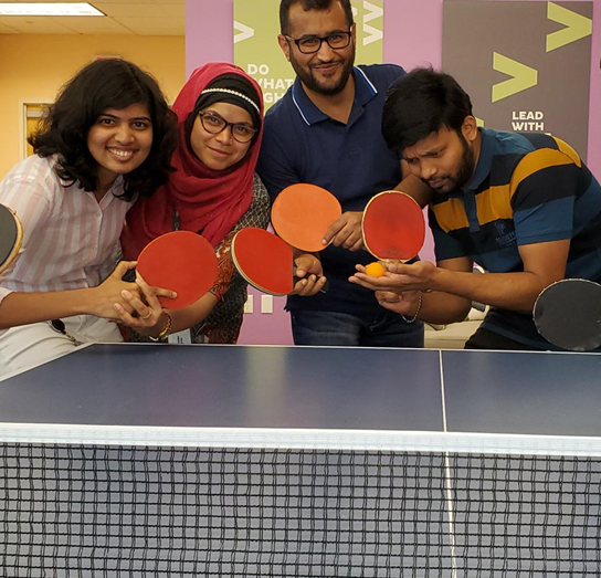 Employees Playing Ping Pong