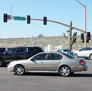 Busy intersection with red light camera in Scottsdale