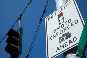 Low,Angle,View,On,A,Photo,Enforced,Red,Light,Camera
