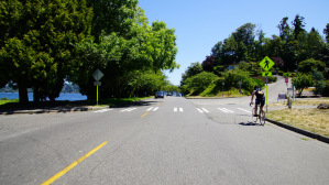 biker in safe zone on roadway