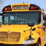 School bus with stop-arm extended