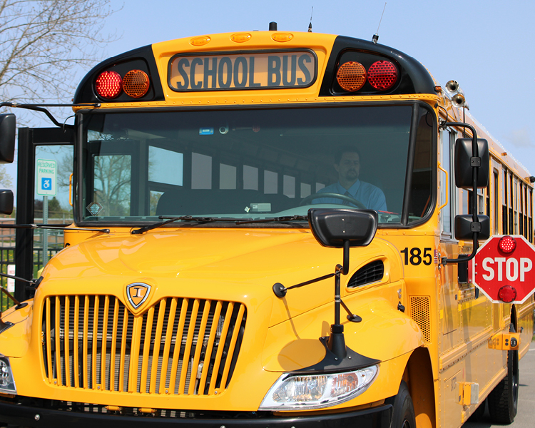 School bus with stop-arm extended