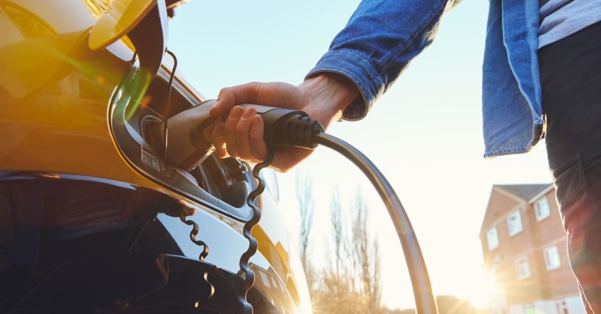 Electric vehicle being charged