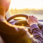 Driver behind the wheel of a car