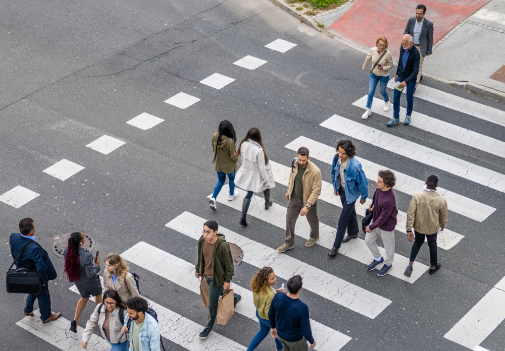 People crossing street at crosswalk