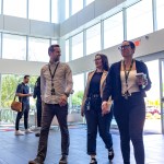 Employees walking in lobby in office