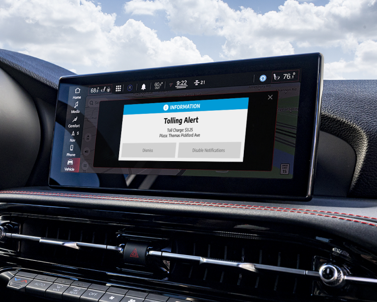 Vehicle dashboard screen displaying toll payment information