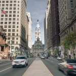 Car driving down street in Downtown Philadelphia