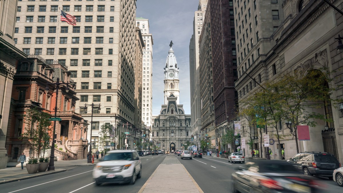 Car driving down street in Downtown Philadelphia
