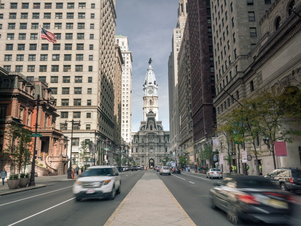 Car driving down street in Downtown Philadelphia