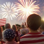 A group of people look at the fireworks for Memorial Day.