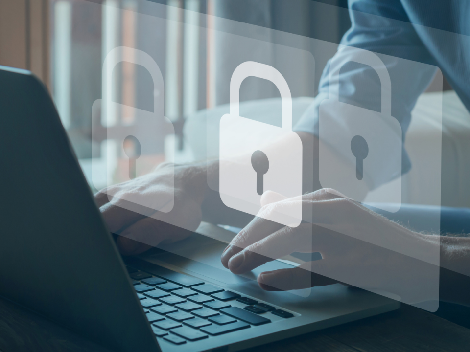 graphic of computer with locks floating above to denote privacy